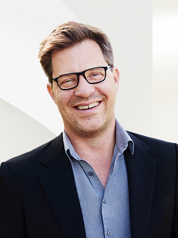 Portrait of Jason Christensen, Global Real Estate Advisor with Engel & Völkers Seattle Downtown.